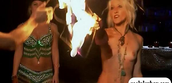  Hot babes fire dancing and give massage